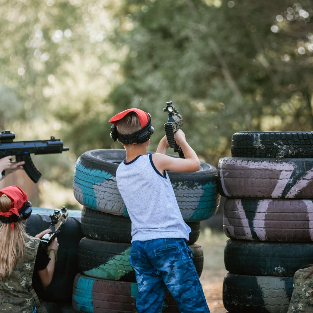 Group of children in shelter during war simulation game